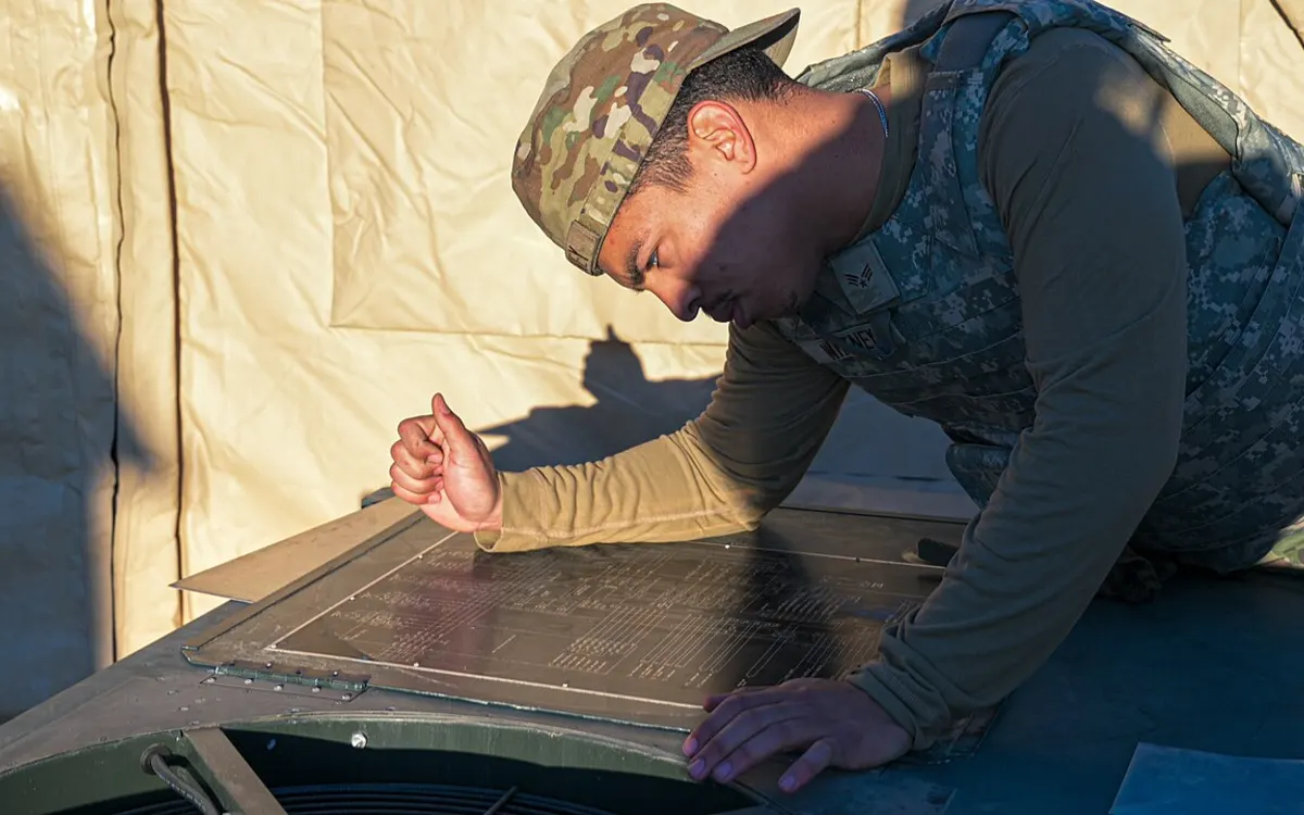 HVAC technicians inspecting equipment at a service location